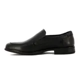 Zapato de vestir negro de cuero, con elásticos laterales y suela de goma.