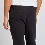 Pantalón de jogging negro de punto con cintura elástica y cordón ajustable.