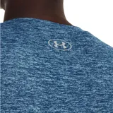 Remera deportiva Under Armour de mujer, color gris jaspeado, de corte amplio y tejido UA Tech™ de secado rápido.