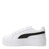 Championes Puma modelo Karmen II con diseño de plataforma, confeccionados en cuero sintético blanco con la clásica franja lateral de la marca en color negro. Presentan cierre con cordones y suela de goma robusta.