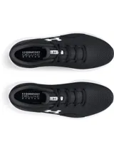 Championes de running Under Armour Charged Surge 4, color negro con logo blanco y suela blanca.