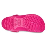 Zueco Crocs Classic Translucent color rosa, con correa trasera pivotante y orificios de ventilación.