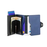 Billetera de cuero genuino color azul medianoche con caja de aluminio integrada. Presenta un sistema de deslizamiento para tarjetas con capacidad para 5 unidades, compartimento para billetes y documentos, y protección RFID. Marca Baleine, modelo Kansas.
