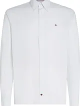 Camisa de manga larga Tommy Hilfiger con estampado de micro puntos, cuello clásico con botones y logo bordado en el pecho.