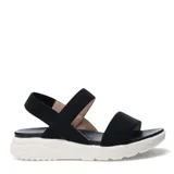 Sandalias de plataforma con tiras elásticas texturizadas en color beige. Presentan una base ergonómica de goma blanca con diseño estriado y plantilla acolchada al tono.