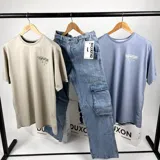 Remera color beige de algodón con estampa en la espalda con el texto "Cafe del Mar Ibiza" y una frase en inglés. Corte clásico y cuello redondo.