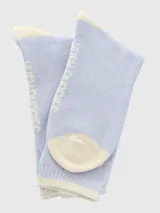 Calcetines grises jaspeados con puño, talón y puntera en color crema.