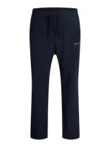 Pantalón jogging azul marino de fit relajado, tiro medio y cintura elástica. Confeccionado en tejido de felpa sin frisa, cuenta con elástico en la cintura, cordón ajustable y bordado sutil en el lateral.