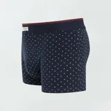Pack de tres boxers de algodón elastizado con cintura elástica. Incluye un boxer liso color bordó, un boxer azul marino con lunares blancos y un boxer bordó con lunares blancos.