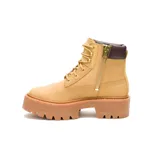 Bota de cuero color miel con plataforma alta y suela dentada. Presenta cordones al tono, cuello acolchado en color marrón oscuro y logo de la marca grabado en el lateral.