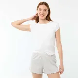 Short de pijama gris melange confeccionado en algodón liso, con cintura elástica y detalle de ondas en el ruedo.