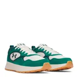 Championes urbanos Under Armour modelo Mirage Sport, con diseño de paneles en color verde y blanco. Presentan suela de plataforma en tono crema y base de goma color caramelo, con el logo de la marca en el lateral y la lengüeta.