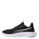 Championes deportivos Puma modelo Flexfocus Lite Modern, color negro con suela blanca. Presentan diseño de malla transpirable, cierre con cordones y logo de la marca en el lateral y la lengüeta.