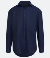 Camisa de vestir Preston Field modelo classic, de manga larga y diseño liso. Cuenta con cuello camisero y cierre frontal con botones al tono.