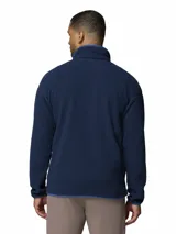 Polar Columbia Helvetia Half Snap azul marino, confeccionado en tejido suave de borreguito, con cuello alto, cierre frontal de botones a presión con solapa en tono beige y un bolsillo con cierre en el pecho con el logo de la marca.