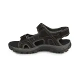 Sandalias Caterpillar modelo Giles para hombre, color negro con detalles en amarillo, con múltiples tiras ajustables con velcro y suela de goma track.