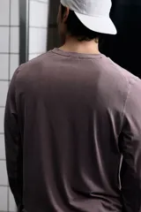 Remera deportiva de manga larga con tejido funcional DryMove, de efecto lavado y corte regular.