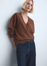 Jeans de tiro alto y corte wide leg, confeccionados en denim azul oscuro con costuras en contraste.