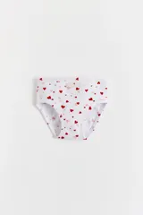 Pack de tres bombachas tipo vedetina de algodón con cintura elástica y etiqueta de la marca. Incluye una unidad lisa en color gris melange, una unidad lisa en color rosa y una unidad blanca con estampado de corazones rojos y rosados.