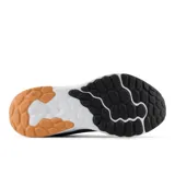 Championes New Balance Arishi V4 para dama, color negro con detalles en rosa y suela blanca.