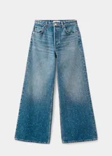 Jeans de tiro medio con diseño wide leg, confeccionados en tejido de algodón estilo tejano. Presentan un acabado con adorno de strass, cierre de botones y cinco bolsillos.