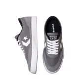 Championes Converse Net Star OX grises con logo lateral blanco y suela blanca.