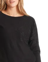 Buzo negro de tejido con strass, marca LIV Milano. Cuello redondo, manga japonesa y largo ¾.