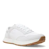 Championes urbanos blancos con detalles en gamuza gris y suela de goma color caramelo.