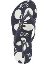 Ojotas Tommy Hilfiger con plataforma pequeña, base azul marino y tiras azules con logo de la marca. Plantilla estampada con flores y números en blanco.