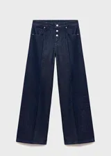 Jeans de tiro bajo confeccionados en 100% algodón estilo tejano vaquero, de diseño recto y largo, con cierre de botones, dos bolsillos laterales y dos bolsillos de parche en la parte posterior.