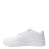 Championes Puma Court Classic blancos de cuero sintético, con detalles en verde y dorado.