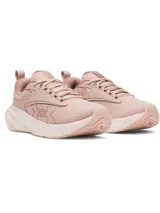 Championes de running Under Armour Surge 5 color rosado, con parte superior de malla transpirable, suela amortiguada y logo de la marca en el lateral.