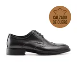 Zapato de vestir acordonado de cuero negro con detalles de perforaciones.