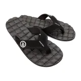 Ojotas negras con plantilla texturizada y logo de Volcom en la tira.