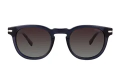 Lentes de sol Azzaro con armazón redondo de acetato en color azul oscuro y cristales polarizados con degradado. Presentan detalles metálicos en las bisagras.