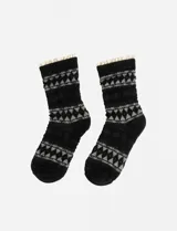 Medias negras con diseño geométrico en gris y blanco, y borde superior con volados de encaje.