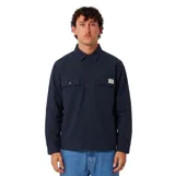 Camisa de manga larga azul marino con bolsillos frontales con solapa y cierre de botones, de corte holgado.