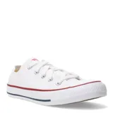 Championes Converse Chuck Taylor All Star de lona color blanco con suela de goma blanca con detalles en rojo y azul.