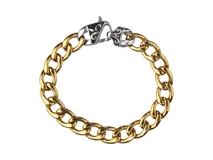 Pulsera de eslabones gruesos dorados con cierre de mosquetón plateado con diseño de flor de liz.