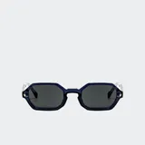 Lentes de sol con armazón hexagonal de plástico reciclado azul oscuro y lentes oscuros con protección UV.