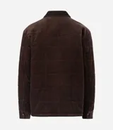 Campera puffer de Marfinno confeccionada en tejido de cotelé de algodón, con diseño acolchado, cuello inglés, cierre frontal con botones y dos bolsillos con solapa en el pecho.