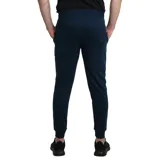 Pantalón jogger de hombre color azul marino, con cintura elástica ajustable con cordón, bolsillos laterales y logo de la marca estampado en blanco en la pierna izquierda.
