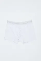 Boxer blanco con elástico gris en la cintura con la inscripción "Uniform".