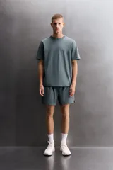 Camiseta de entrenamiento Zara Athleticz, de corte regular, color gris azulado, con cuello redondo en rib doble y manga corta.