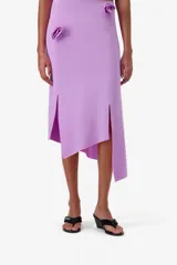 Sandalias de cuña color negro de neopreno con diseño de tipo thong, tiras acolchadas y etiqueta con la marca Coperni en el lateral.