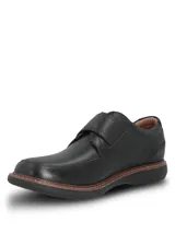 Zapato de cuero negro con cierre de velcro, suela de goma EVA flexible y diseño ergonómico.