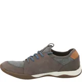 Sneaker Hush Puppies modelo Space, con diseño de paneles en cuero y tejido mesh. Presenta cordones azules, cuello de lycra para mayor ajuste y suela de goma con entresuela de EVA para amortiguación.