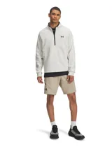 Shorts deportivos Under Armour modelo Unstoppable, confeccionados en tejido elástico y repelente al agua. Presentan cintura elástica con cordón interno, bolsillos laterales abiertos y un bolsillo con cierre en el lateral derecho. Incluye el logo de la marca estampado en la pierna.