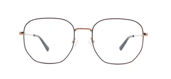 Armazón de metal color dorado con frente negro y forma redonda.