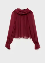 Blusa semitransparente de viscosa color bordó, de diseño oversize, con cuello drapeado y un adorno de fular integrado en el cuello. Cuenta con manga larga y puños elásticos.